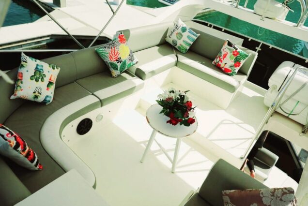 48ft Gulf Craft Yacht flybridge lounge with table Dubai Marina sunset cruise