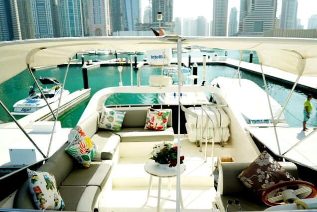 48ft Gulf Craft Yacht flybridge lounge with table Dubai Marina sunset cruise