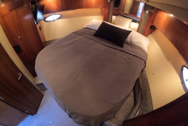 Luxury 47ft Ammos Cruiser master cabin bedroom Dubai yacht rental