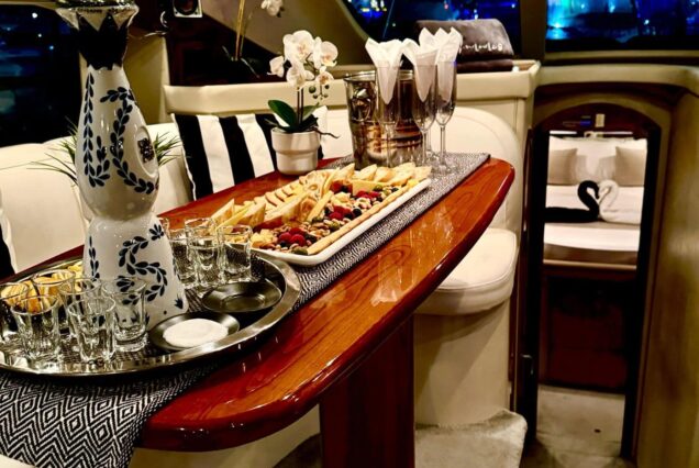 Luxury 47ft Ammos Cruiser interior dining area Dubai private cruise