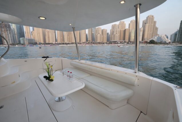 Luxury 63ft SEA RAY flybridge lounge with table Dubai Marina sunset cruise