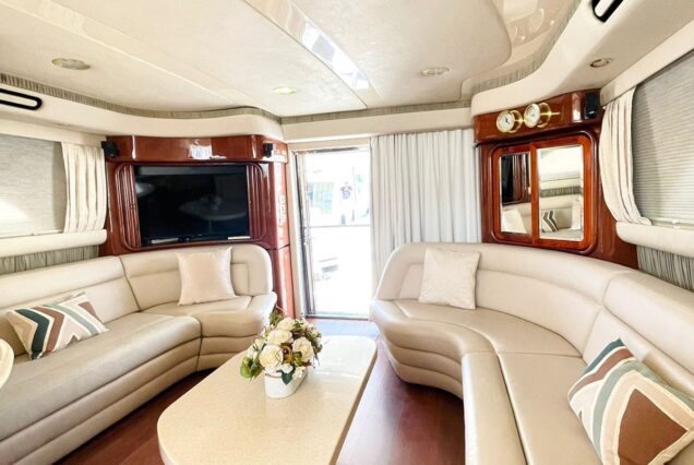 Luxury 63ft SEA RAY yacht salon lounge with table Dubai Marina rental
