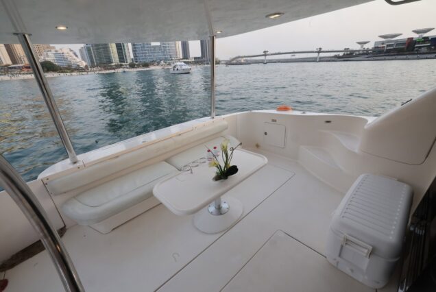Luxury 63ft SEA RAY flybridge lounge with table Dubai Marina sunset cruise