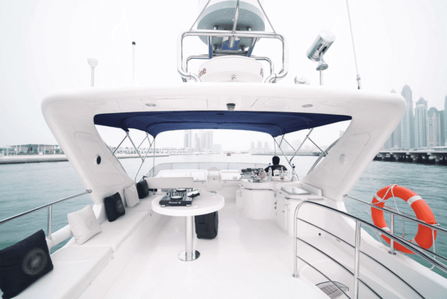 66ft Majesty Bella Vita upper deck lounge with table Dubai Marina sunset cruise