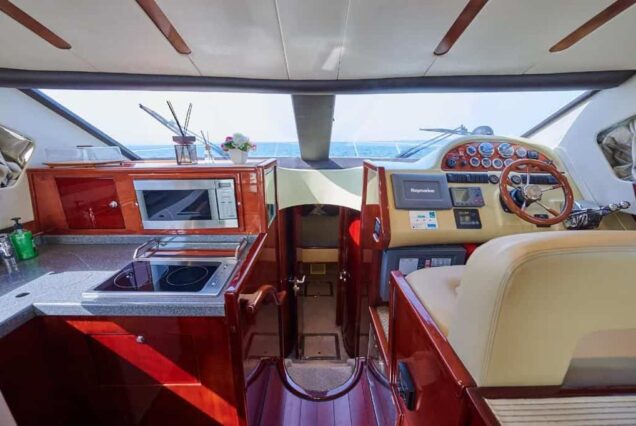 Rose 52ft Majesty salon and kitchen interior Dubai charter