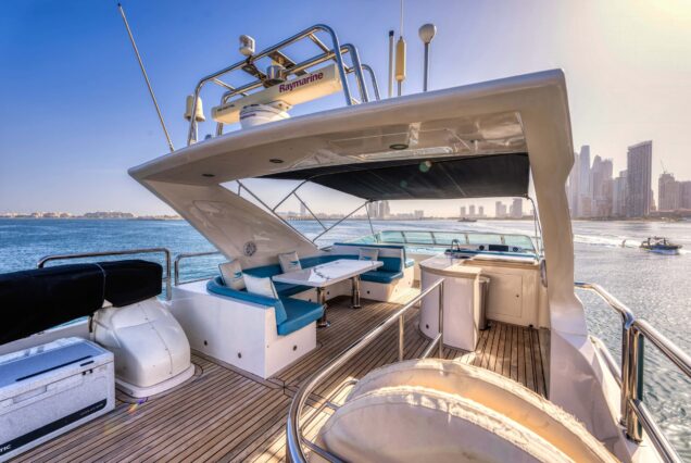 Luxury 77ft Diamond Dust Dubai upper deck seating with table for dining, drinks, and celebrations