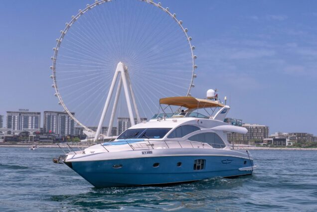 Blue Moon 64ft Yacht Dubai bow lounge area with stunning views of Dubai’s waterfront and skyline