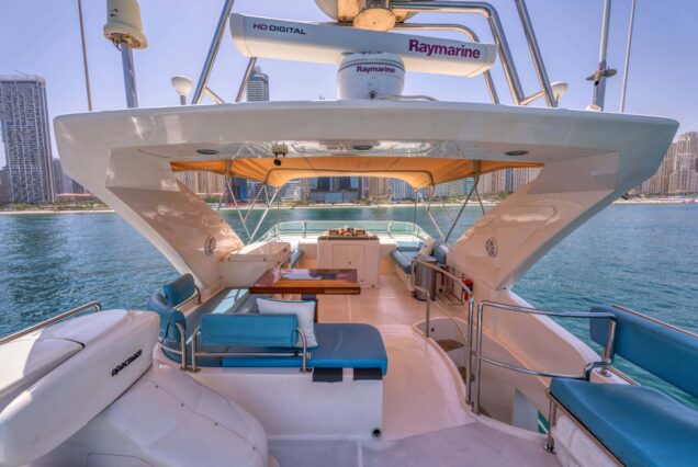 Blue Moon 64ft Yacht Dubai upper deck seating with table for dining, drinks, and celebrations