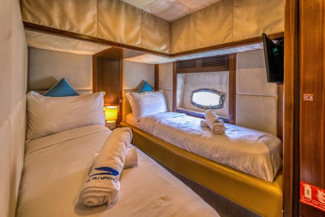 Blue Moon 64ft Yacht Dubai guest cabin with refreshed interiors and premium sleeping comfort