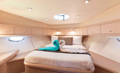 64ft Luxurious Sunseeker master cabin bedroom with bathroom Dubai yacht rental