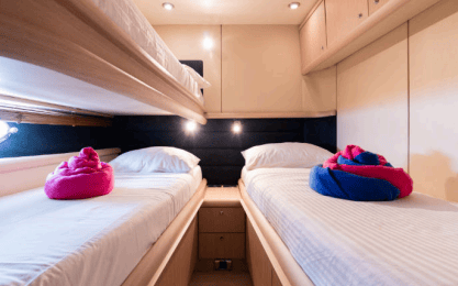 64ft Luxurious Sunseeker master cabin bedroom with bathroom Dubai yacht rental