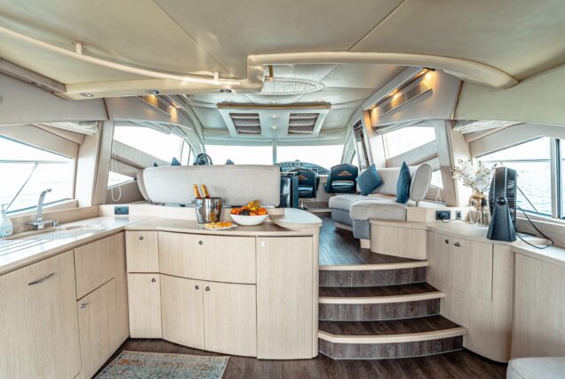 The 68ft Modern Yacht features a modern and comfortable indoor area for relaxing.