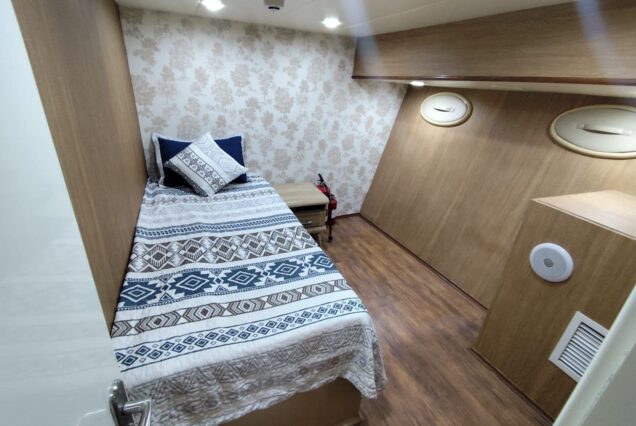 85ft Celebration Yacht Dubai guest cabin with elegant interiors and comfortable sleeping accommodations