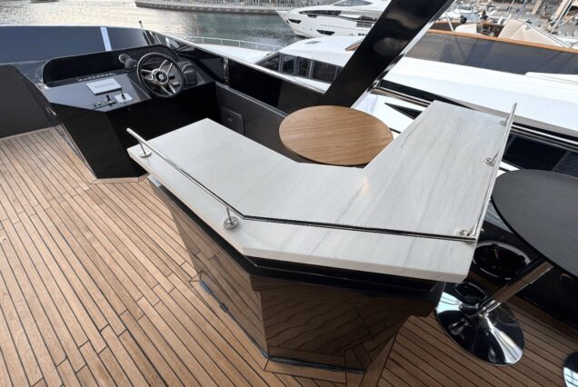 The 100ft Black Omega features a spacious flybridge, ideal for relaxing and enjoying panoramic views.