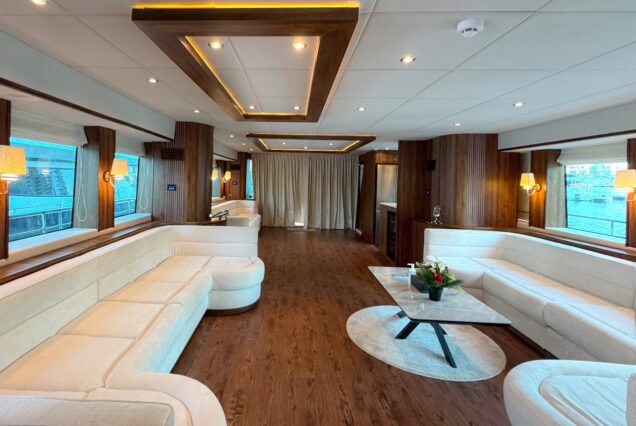 The 100ft Black Omega features an elegant and comfortable indoor area for relaxing during the charter.