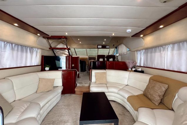 Princess 65ft Dubai indoor salon with comfortable seating and a welcoming atmosphere