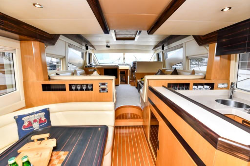 56ft Royal Deluxe Dubai stylish indoor salon with plush seating and modern décor