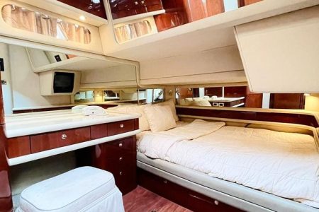 Luxury 63ft SEA RAY master cabin bedroom with bathroom Dubai yacht rental