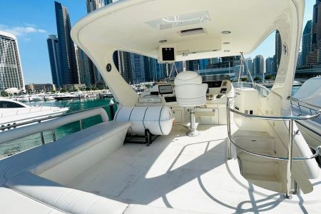 Luxury 63ft SEA RAY yacht upper deck lounge with table Dubai Marina sunset cruise