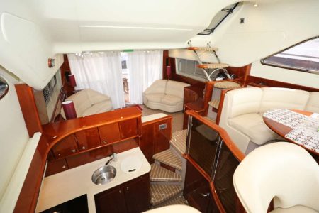 60ft Princess Yacht salon lounge with table Dubai Marina rental