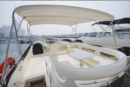 60ft Princess Yacht upper deck lounge with table Dubai Marina sunset cruise
