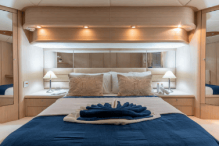 64ft Luxurious Sunseeker master cabin bedroom with bathroom Dubai yacht rental